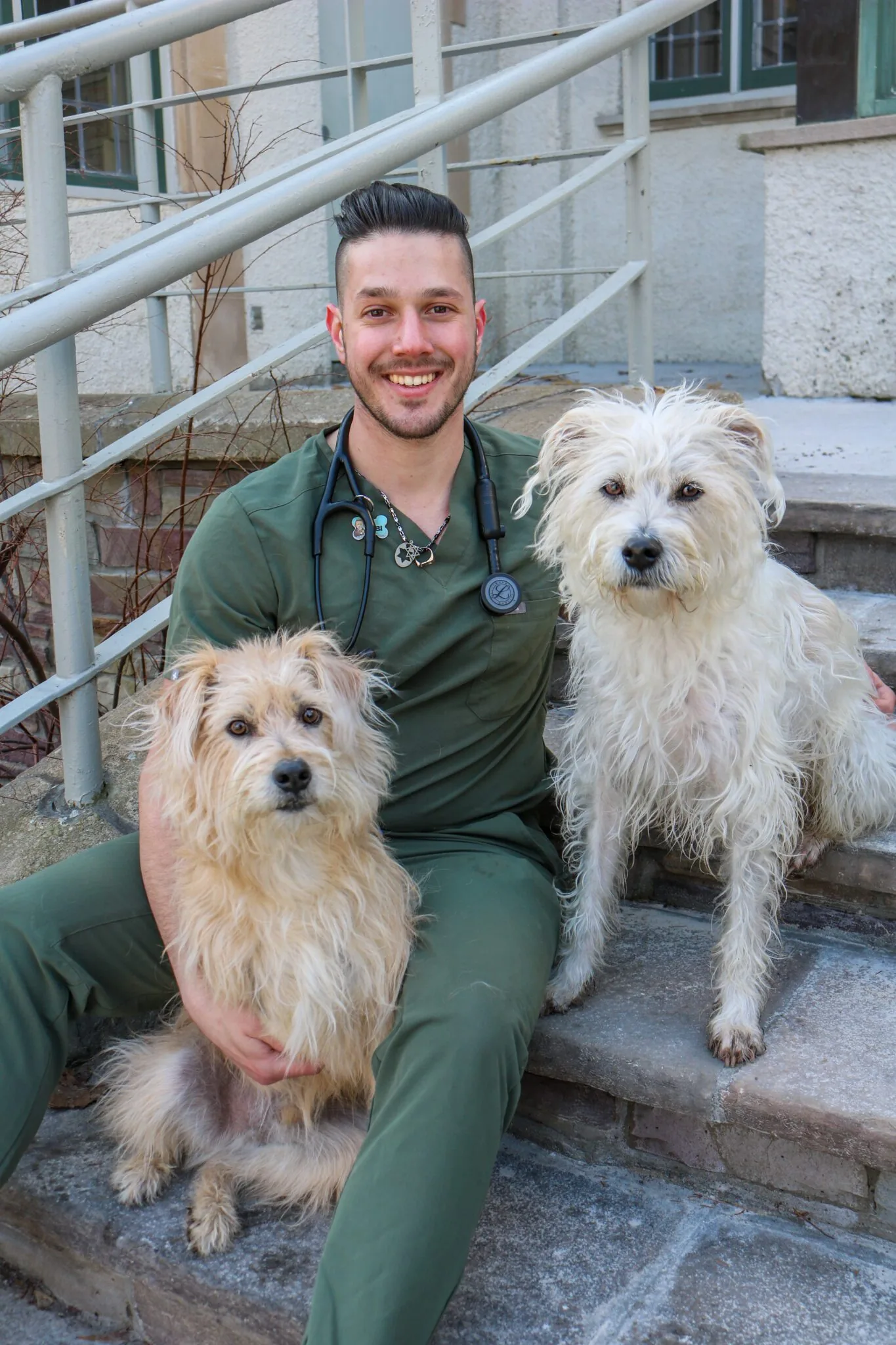 dr george reisman with two dogs